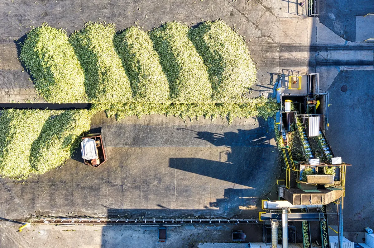 Aerial view of industrial corn processing with machinery in Plainview, Minnesota.