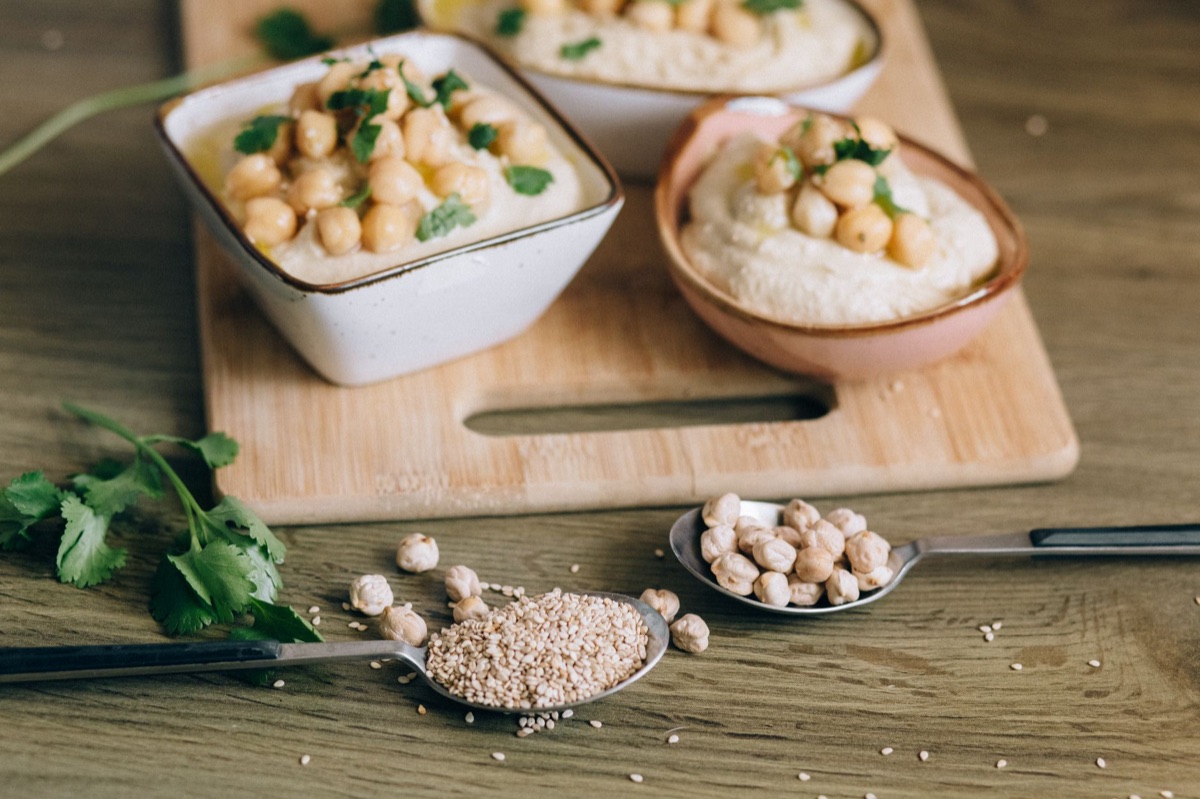 Blocks of tofu arranged near dipping sauce