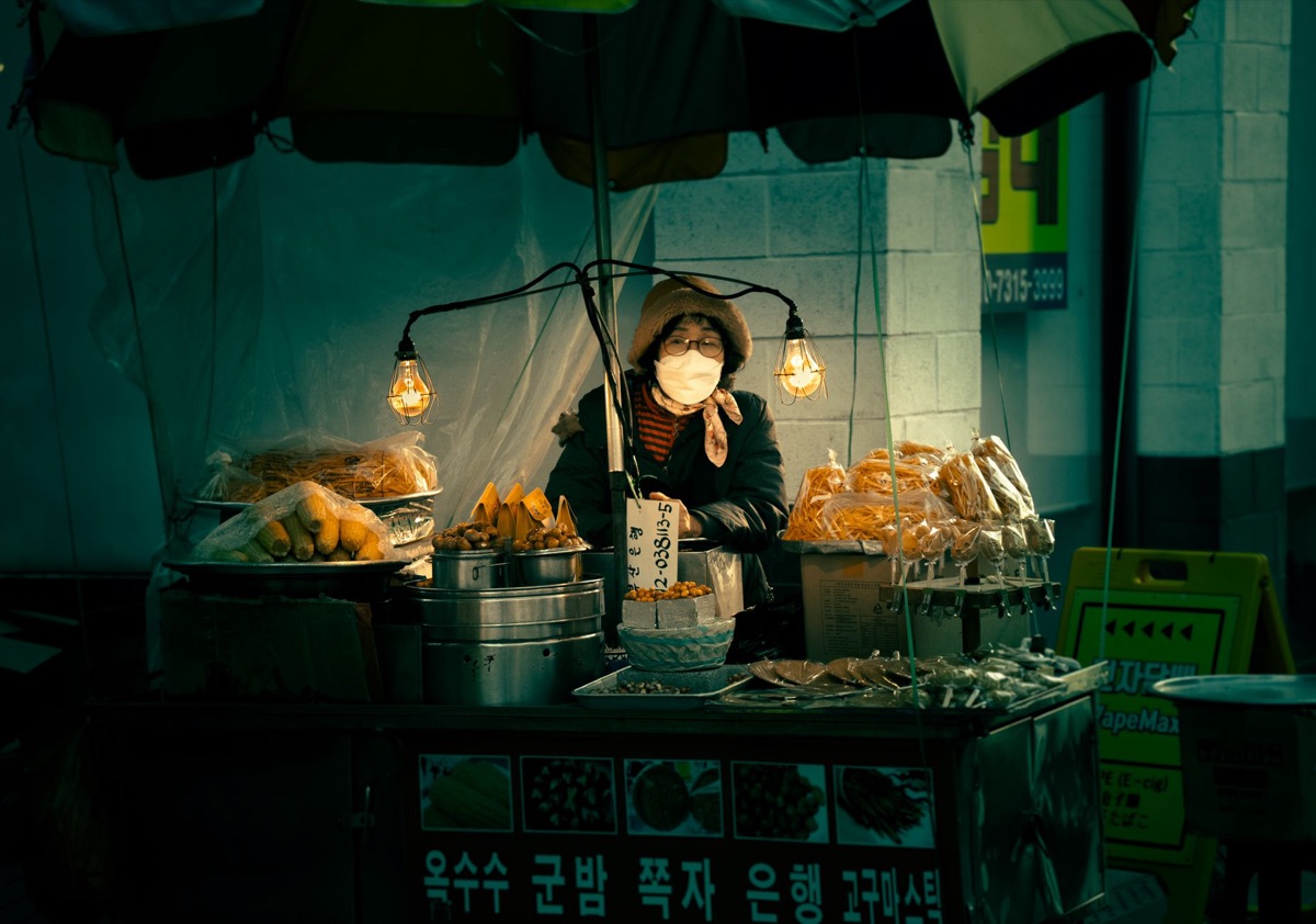 Korean street food vendor with steamed bun