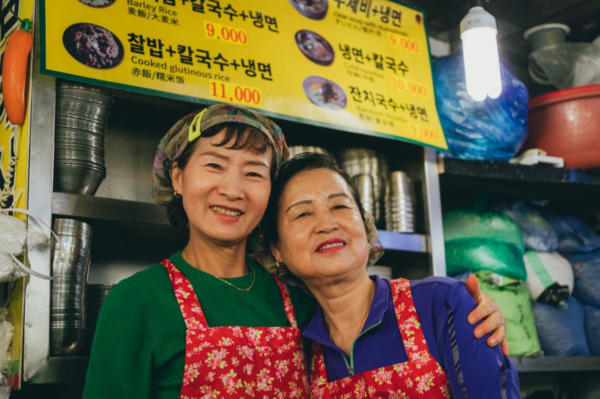 traditional korean street food stall with hot dishes